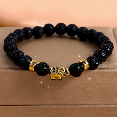 Set Of Four Handmade Beaded Bracelet Set with Gold-Tone Elephant