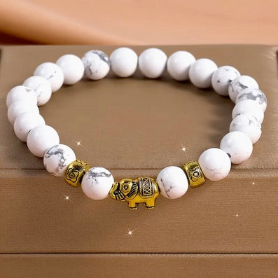 Set Of Four Handmade Beaded Bracelet Set with Gold-Tone Elephant