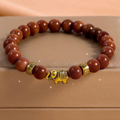 Set Of Four Handmade Beaded Bracelet Set with Gold-Tone Elephant